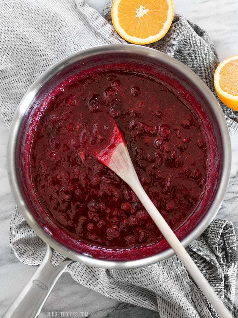 A pot full of simple and classic homemade cranberry sauce, ready to liven up your holiday table!