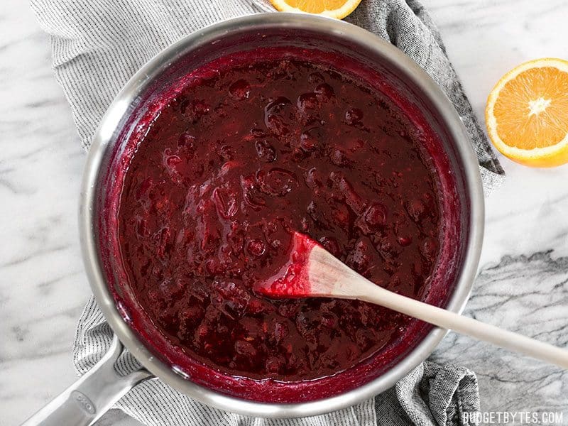 A pot full of simple and classic cranberry sauce brightened with orange essence.