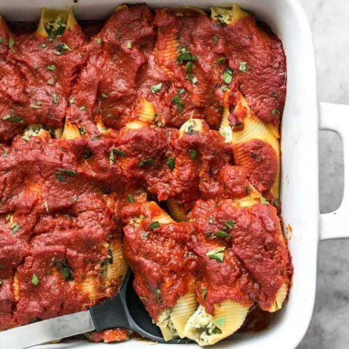 Pesto Stuffed Shells are an easy and impressive dish that is a filling and flavorful alternative to a meat-heavy Italian meal. BudgetBytes.com