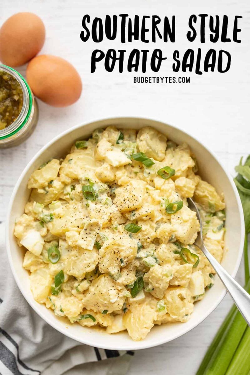 overhead view of a bowl full of southern style potato salad, title text at the top