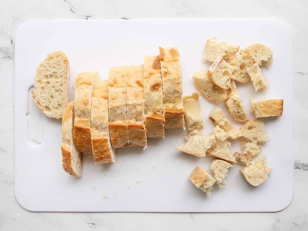 Bread being cut into squares