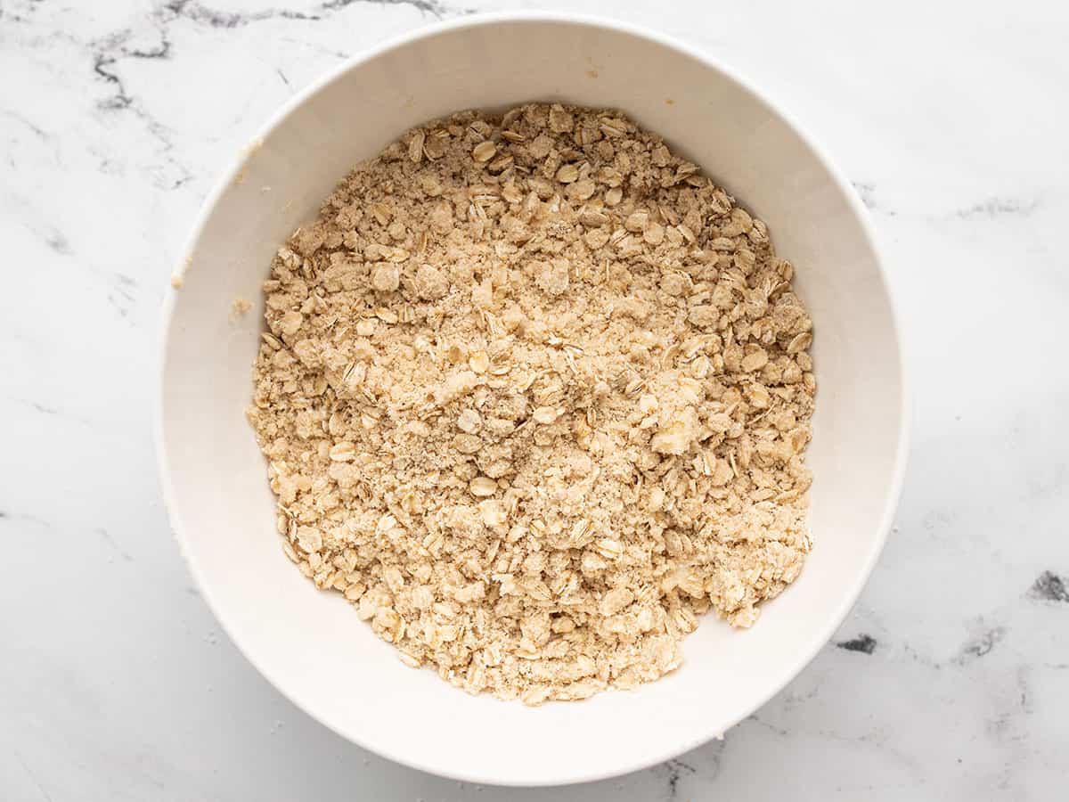 Butter mixed into the dry ingredients in the bowl