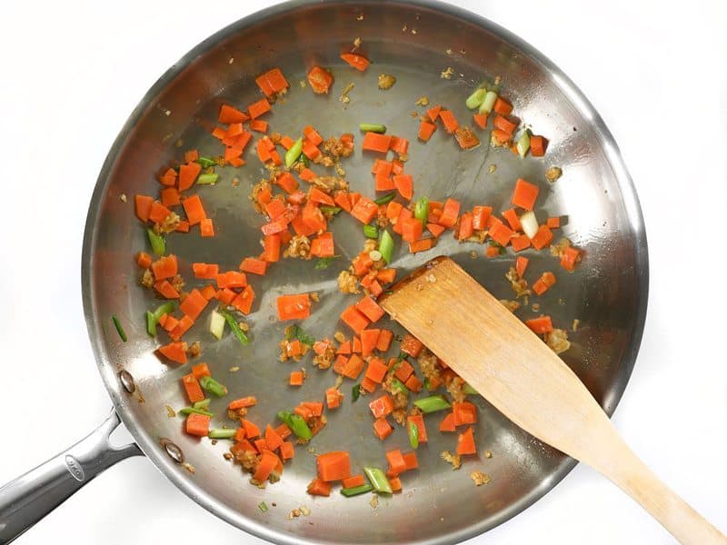 Add Carrot and Green Onion to pan 