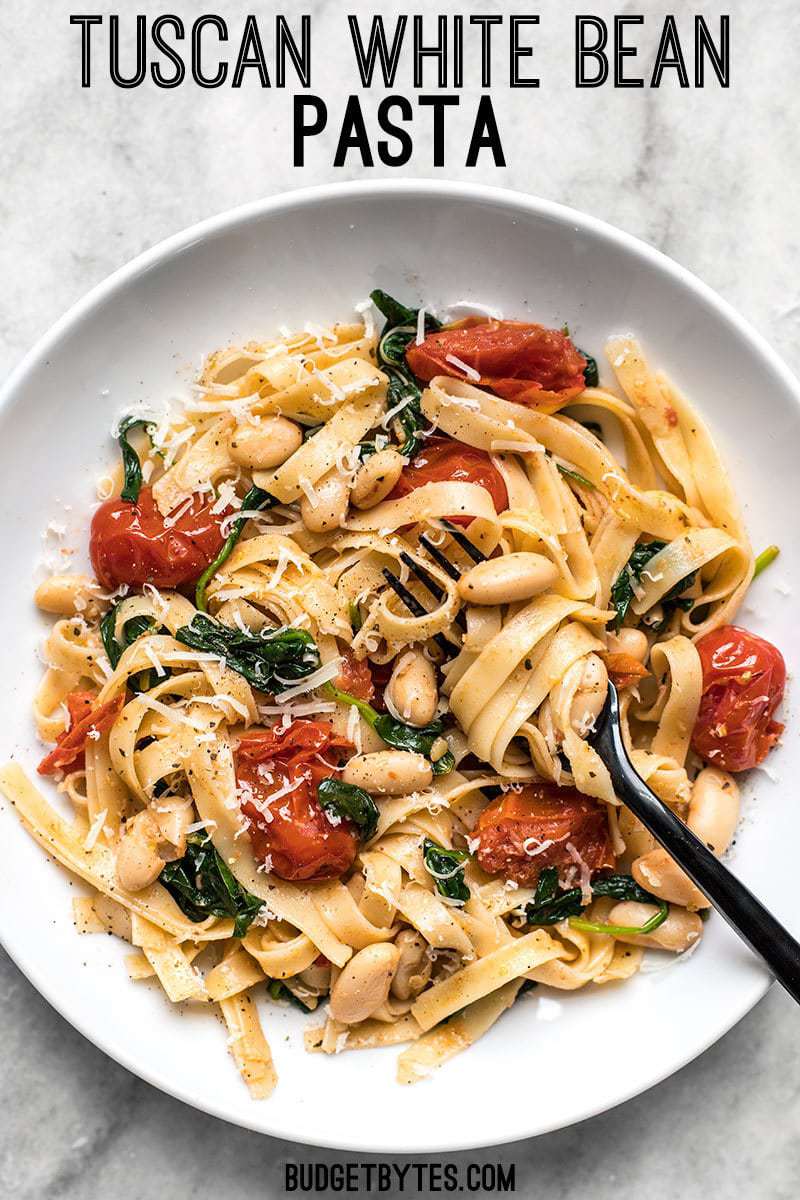 This Tuscan White Bean Pasta is a fast and flavorful dish that is perfect for weeknight dinners. The caramelized garlic, basil, and Parmesan pack a huge flavor punch! BudgetBytes.com