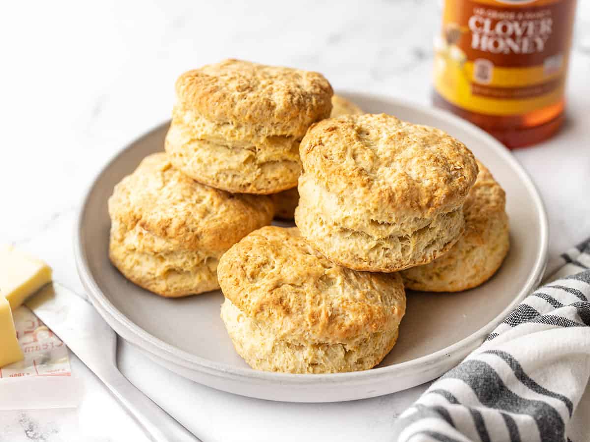 Side view of a plate full of butter biscuits