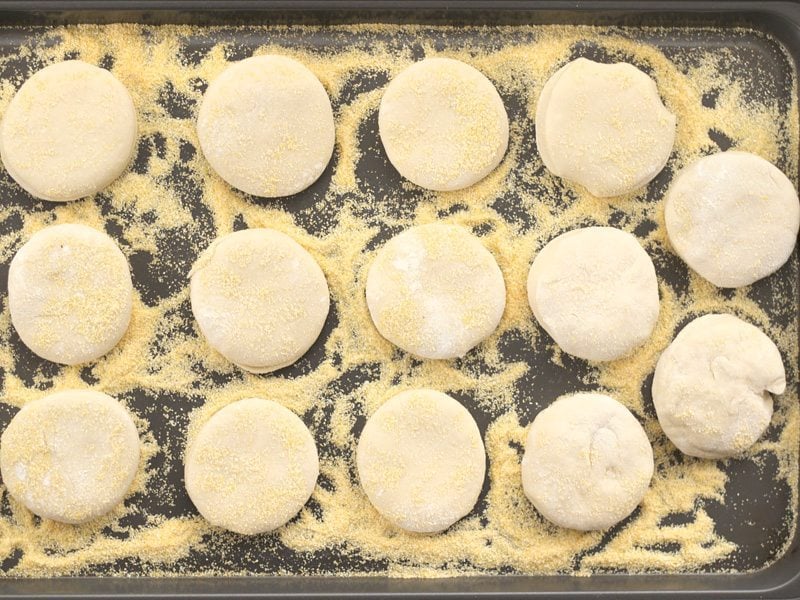 Unbaked Muffins on Cornmeal lined baking sheet