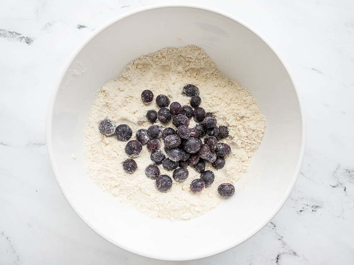 Frozen blueberries added to the flour mixture