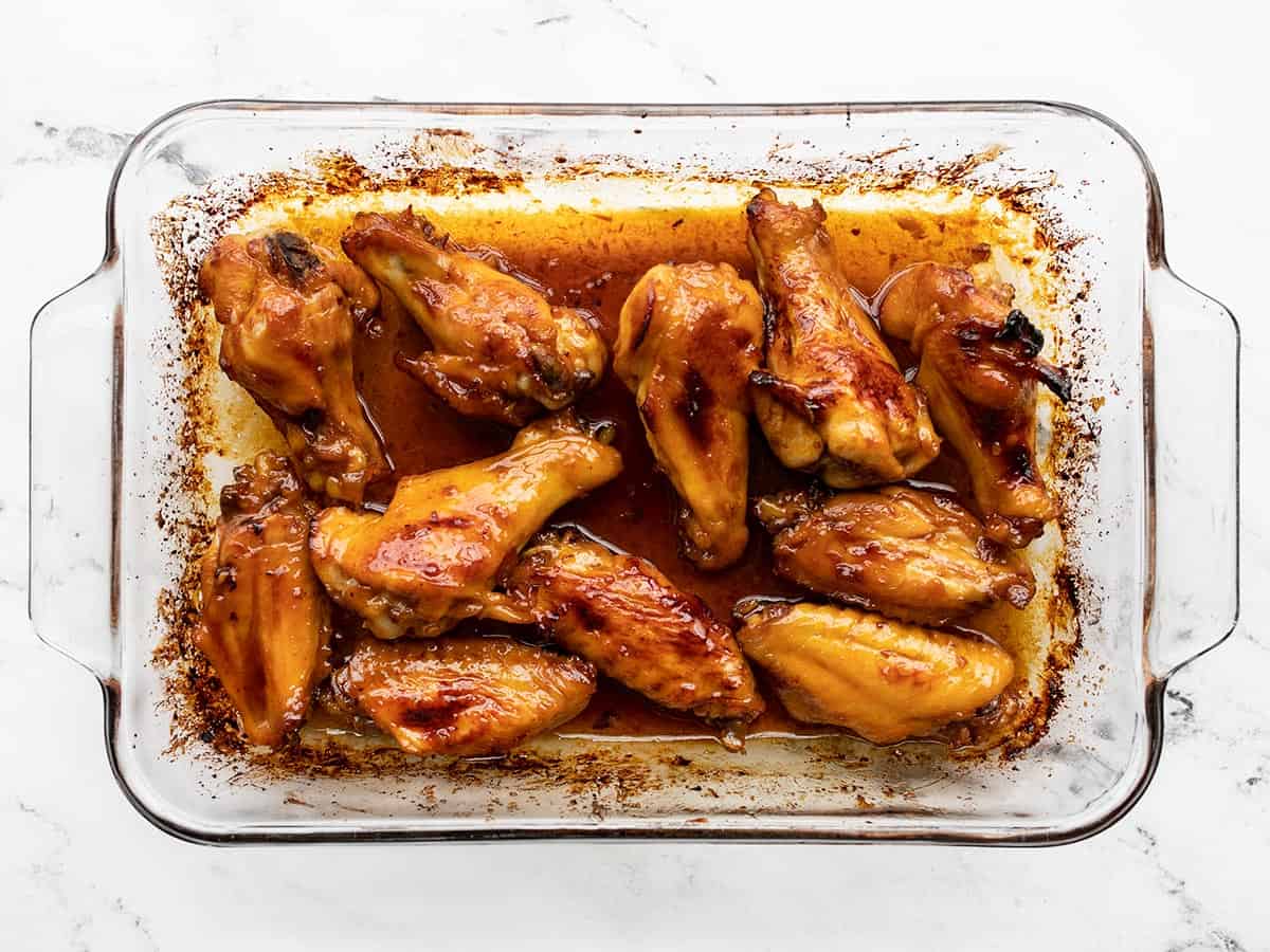 Finished sticky ginger chicken wings in the casserole dish