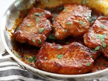 Glazed Pork Chops are the easiest, juiciest, and most flavorful chops you'll ever make! BudgetBytes.com