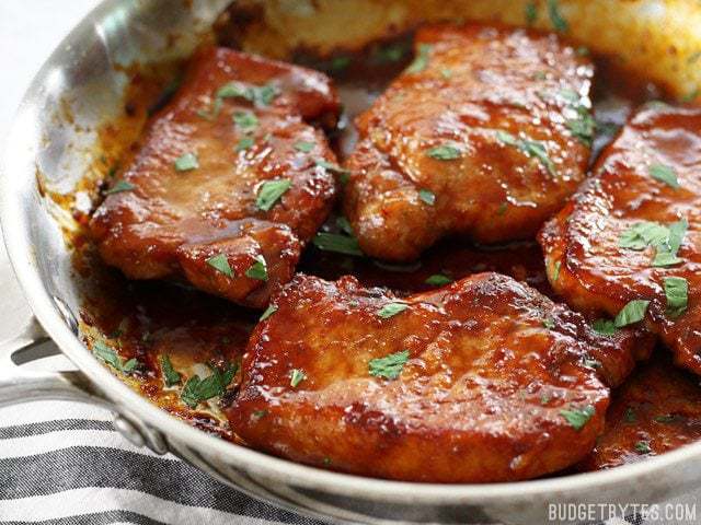 Close up of finished Glazed Pork Chops in the skillet