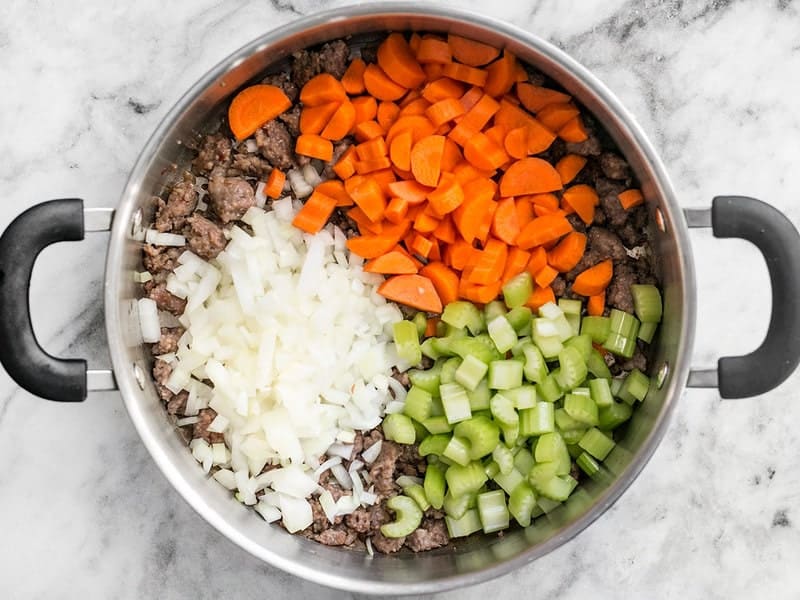 Carrots, Onion, Celery, Garlic added to cooked ground beef 