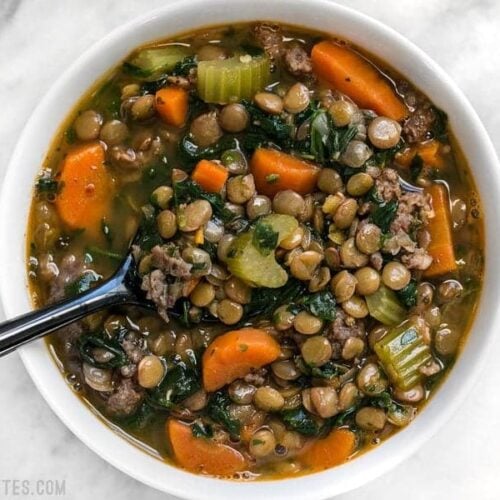 Lentil & Sausage Stew is a fast and easy soup bursting with flavor and chock full of good-for-you vegetables! Plus it freezes well for later. BudgetBytes.com