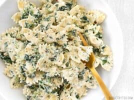 It's like having your favorite restaurant appetizer for dinner! Spinach artichoke pasta is filling, flavorful, and creamy! BudgetBytes.com