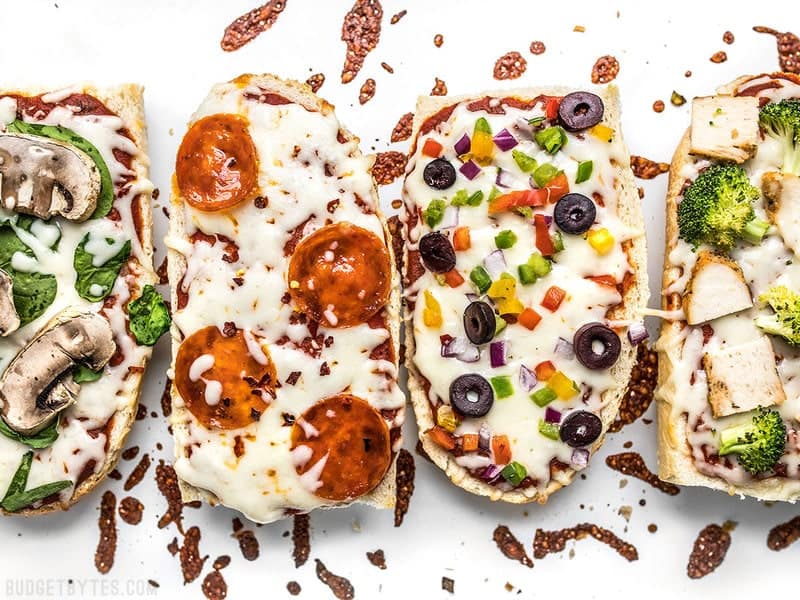 French Bread Pizza is the perfect budget-friendly fast and easy weeknight dinner. Customize the toppings to fit your taste buds or what you have on hand! Budgetbytes.com