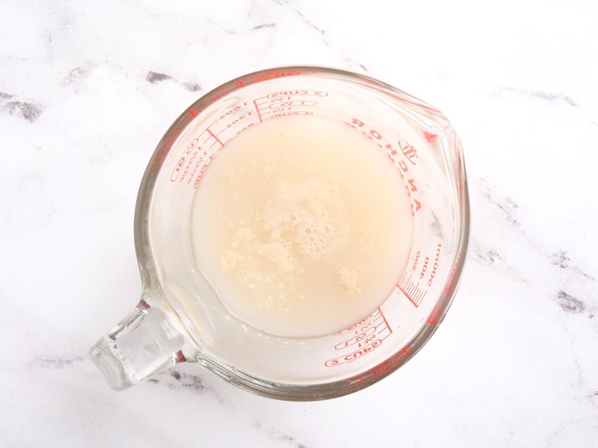 Yeast and water in a measuring jug.
