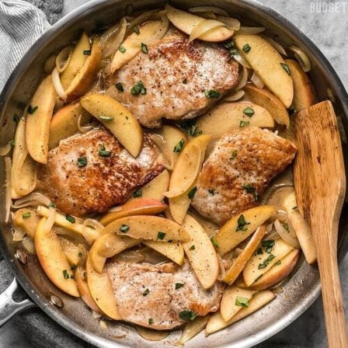 These Apple Spice Pork Chops are smothered with apples, onions, cinnamon, and butter which make a rich, flavorful, sweet, and savory main dish. BudgetBytes.com