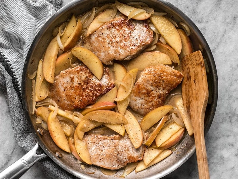 Simmer Pork Chops in Apples and Onions