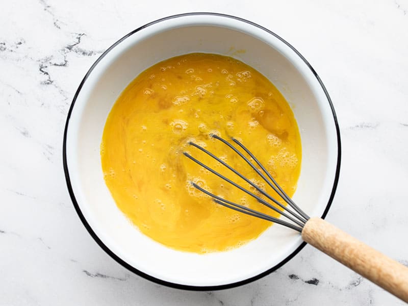 Whisked eggs in a bowl