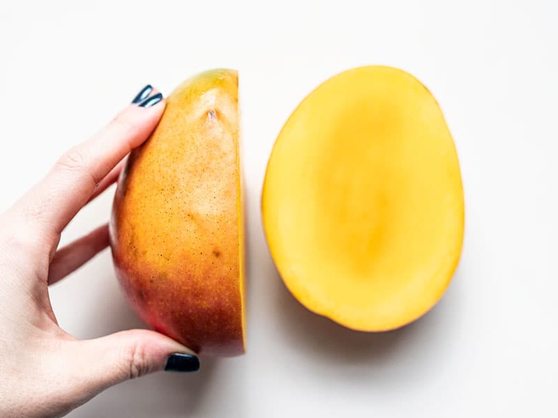 Mango with one cheek cut off.