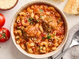 Overhead view of a bowl of hearty meatball soup.