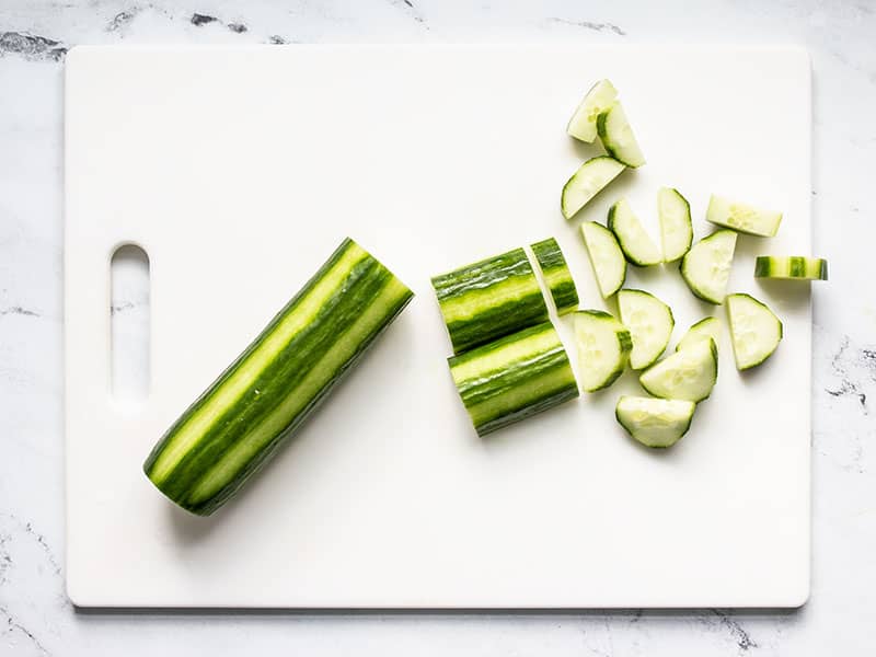 Partially peeled and sliced cucumber