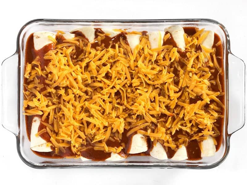 Top enchiladas with Cheese
