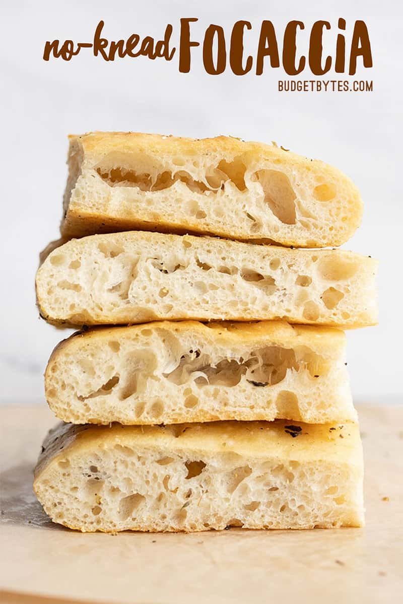 A stack of no knead focaccia slices with title text at the top