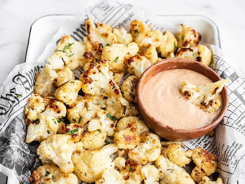 Side view of a tray full of Garlic Parmesan Roasted Cauliflower