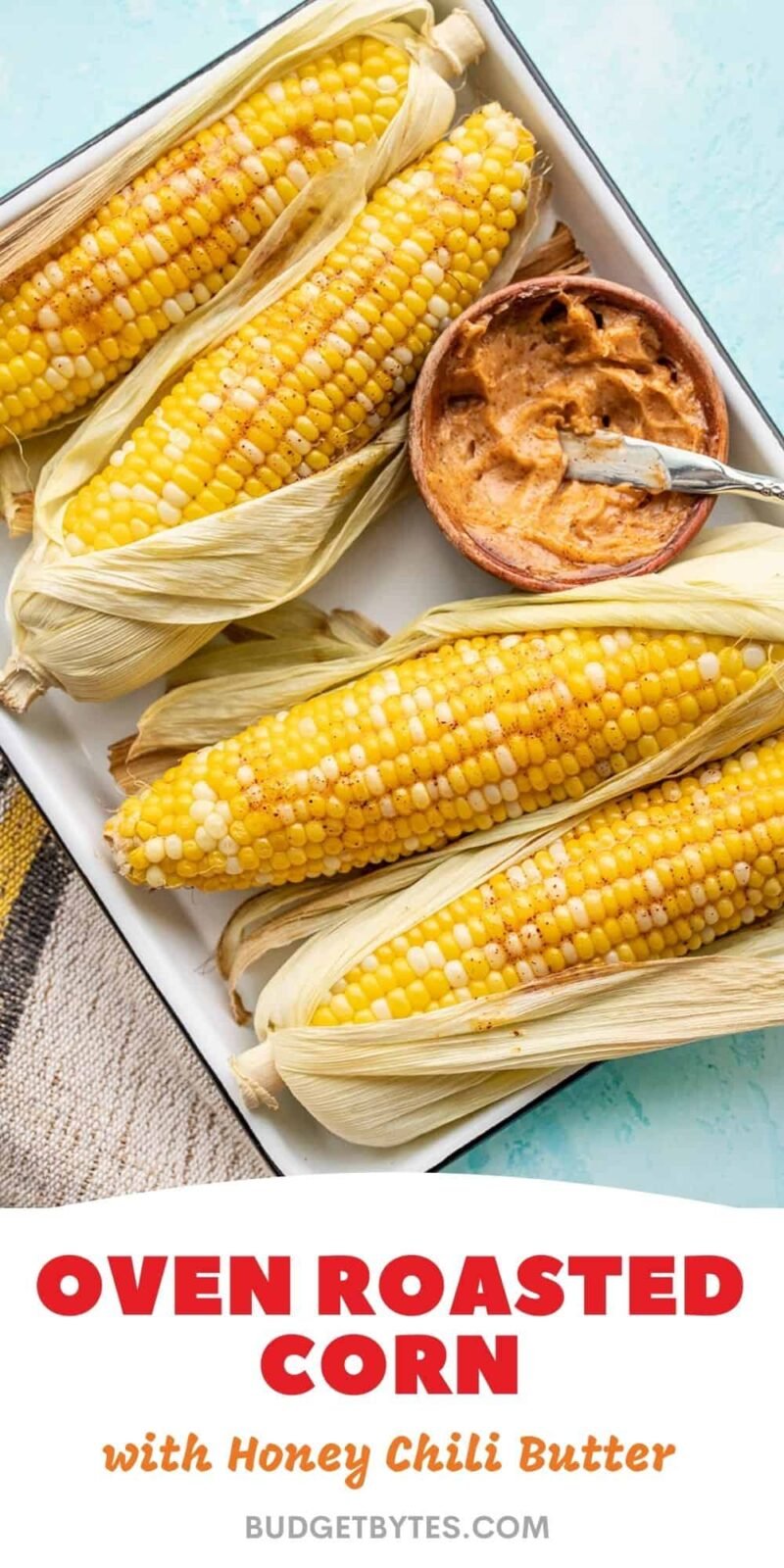 Oven Roasted Corn on a tray with a bowl of honey chili butter, title text at the bottom