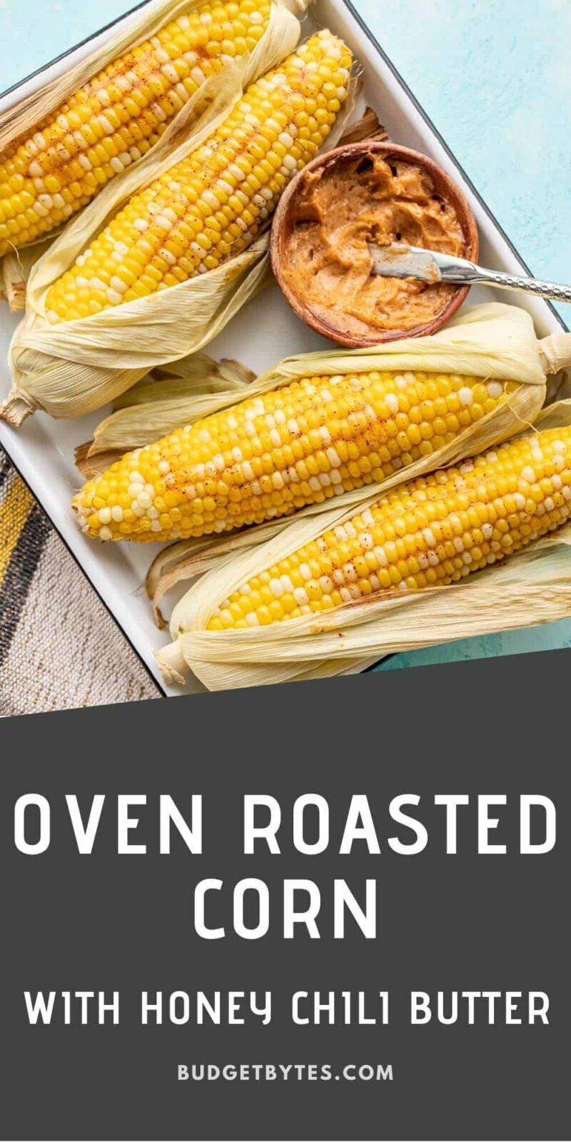Oven roasted corn on a tray with a bowl of honey chili butter, title text at the bottom