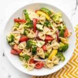 Overhead view of a bowl full of summer vegetable pasta salad