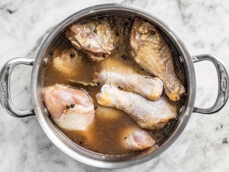Water added to pot of chicken to boil 