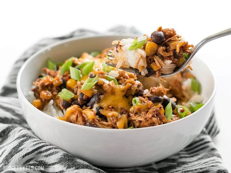 Side view of a Slow Cooker Taco Chicken Bowl being eaten
