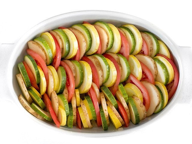 Layered vegetables in baking dish