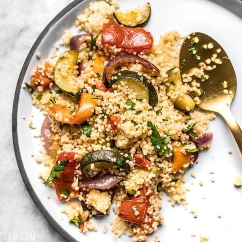 Roasted Vegetable Couscous is an easy side dish with complex flavor, with sweet roasted vegetables mixed with savory, fluffy couscous. Budgetbytes.com