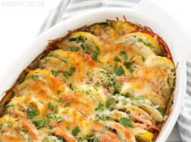 Fresh summer vegetables and savory herbs are layered together then topped with cheese before baking to perfection in this Summer Vegetable Tian. BudgetBytes.com