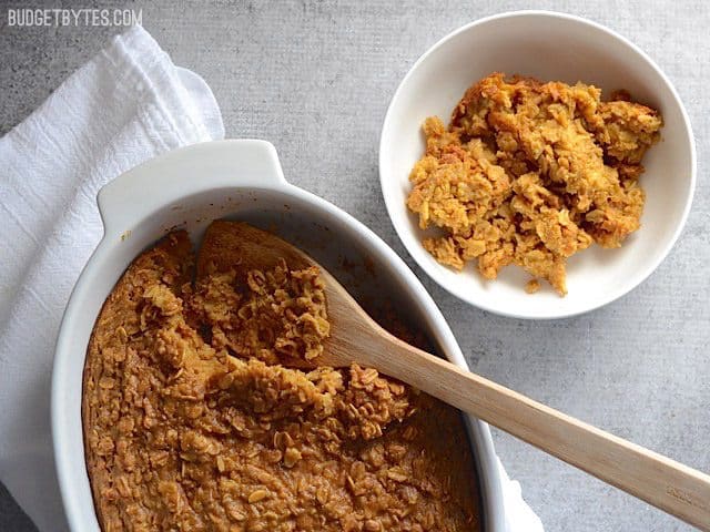 Baked Pumpkin Pie Oatmeal being served into a bowl