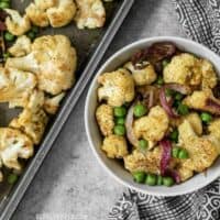 Add big flavor to plain cauliflower with this simple yet delicious Curry Roasted Cauliflower recipe. BudgetBytes.com