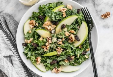 This Apple Dijon Kale Salad is tangy, sweet, and crunchy with Granny Smith apples, walnuts, raisins, and a homemade Dijon vinaigrette. BudgetBytes.com