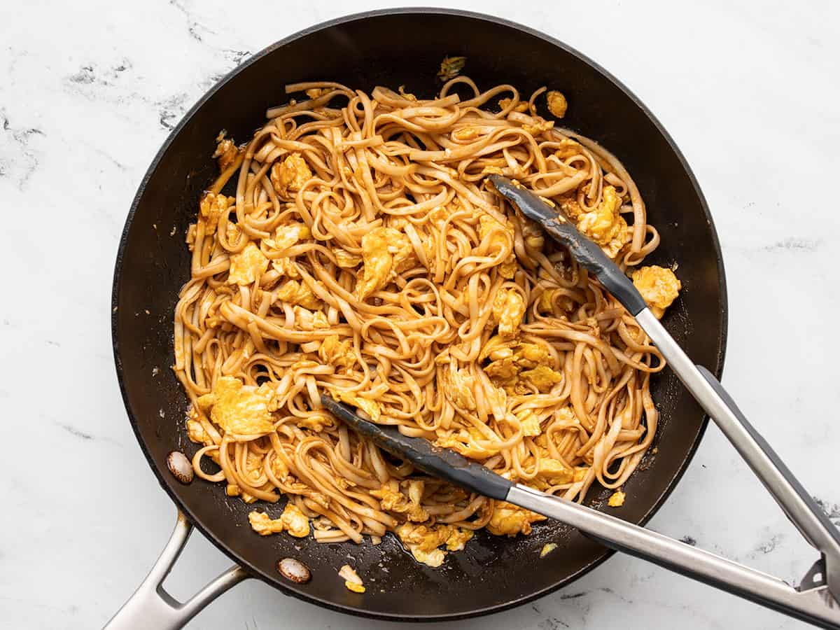 noodles and eggs tossed in the sauce