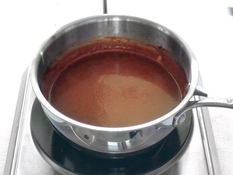 It only takes 10 minutes to make this super easy red enchilada sauce that is bursting with flavor. Never buy the canned stuff again! BudgetBytes.com