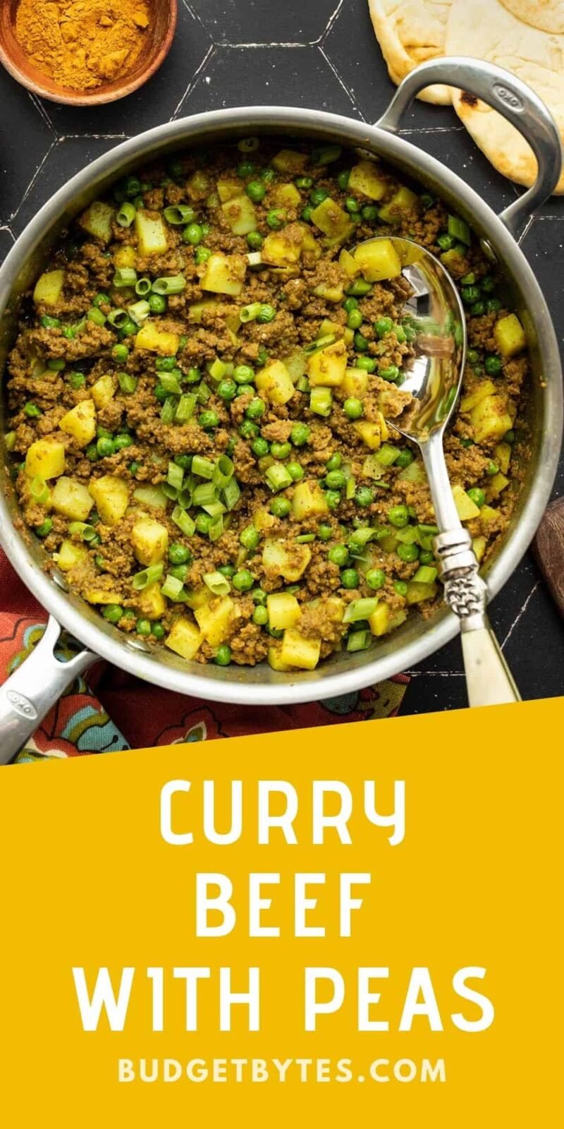 A skillet full of curried ground beef with peas and potatoes, title text at the bottom