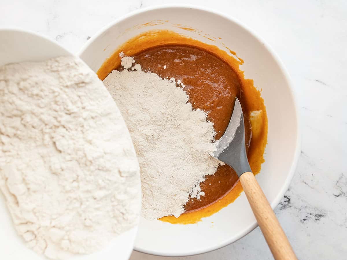 combine wet and dry ingredients for pumpkin bread