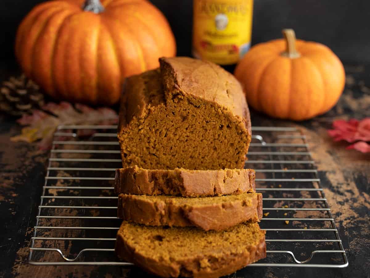 Front view of a sliced loaf of pumpkin bread