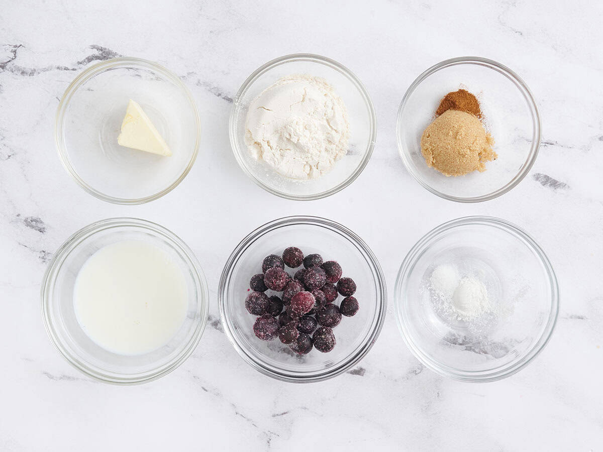 ingredients to make a blueberry mug muffin