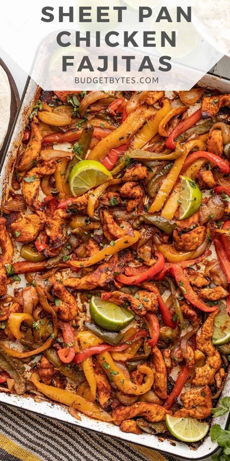 close up of chicken fajitas on the baking sheet, title text at the top.