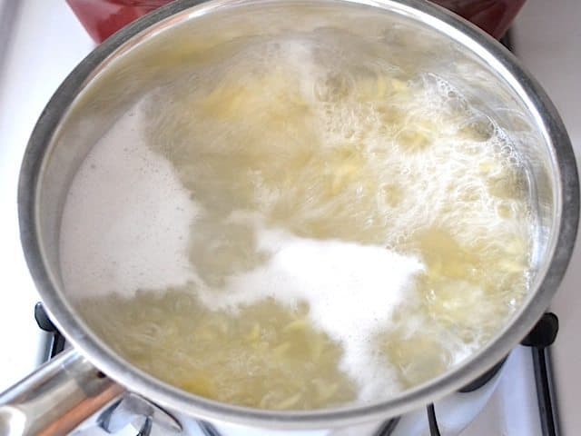 orzo pasta in a pot of boiling water 