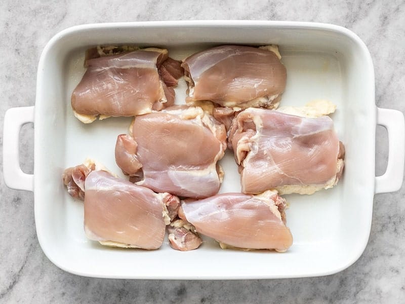 Raw Chicken Thighs in Dish