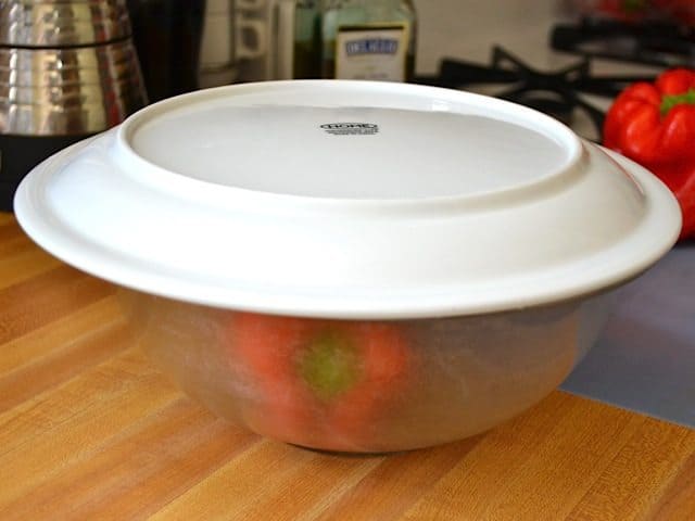 peppers placed back in covered container to steam again 