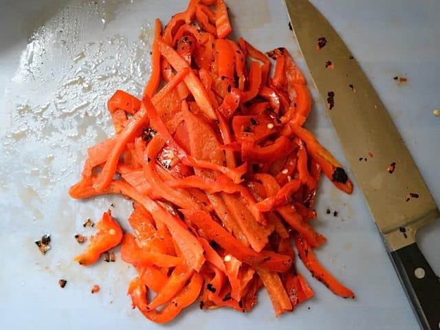 slicing peppers with knife 